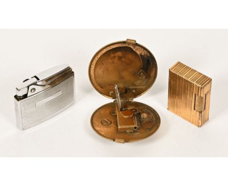 Three vintage cigarette lighters, to include Dupont Serial No. DH0558 and an unusual lighter in the form of a compact.