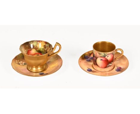 Two Royal Worcester cups and saucers, the first a coffee can and saucer decorated with fruit and signed Moseley, the second a
