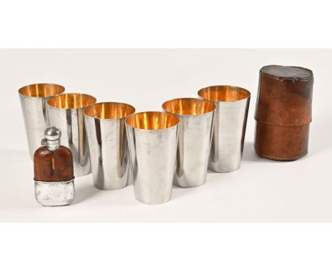 Army & Navy six silver plated stacking cups with leather case, the first cup height 13 cm, diameter +/- 8.5 cm, together with