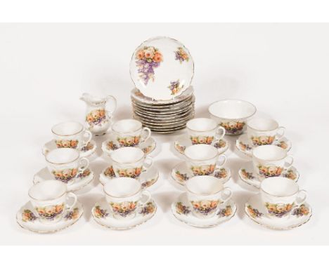 A vintage floral Czechoslovakian porcelain tea service, twelve place settings (38 pieces).
