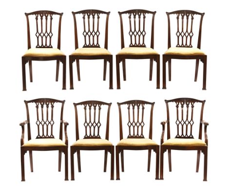 A set of eight Chippendale style mahogany dining chairs, comprising two arm and six single chairs each with serpentine front.