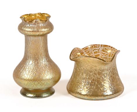 Two Art Nouveau Loetz style iridescent crackle effect vases, the first +/- 18 cm, the second +/- 10 cm.