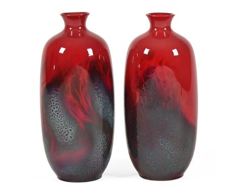 Royal Doulton a pair of flambe veined vases, model 1619.  Height +/- 29 cm. CONDITION REPORT: There is a crack in the neck +/