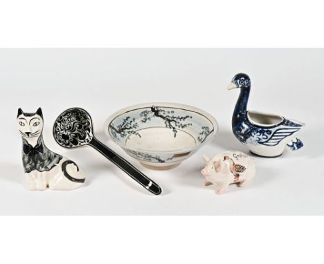 Five items of studio pottery, comprising an Alan Ball floral patterned bowl, 26 cm diameter, 9 cm high, a patterned ladle, G.