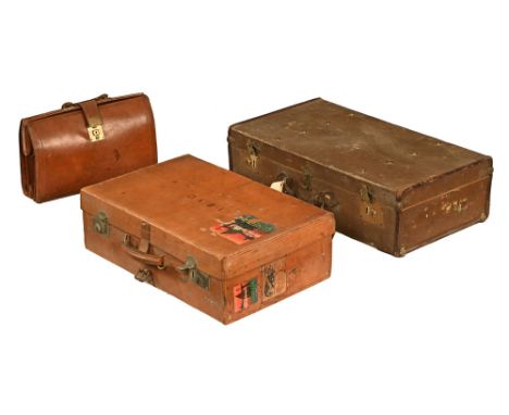 Two suitcases and a briefcase, the first pigskin made by Finnigans Bond Street London, height 19 cm, width 61 cm, depth 39 cm