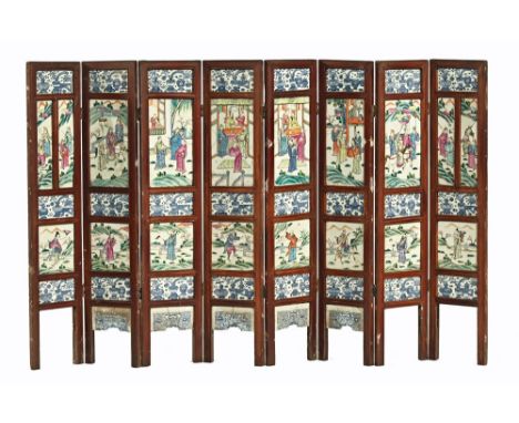 A Chinese porcelain tiled screen, circa 19th century with forty seven panels.  Height 81 cm and each panel having a width of 