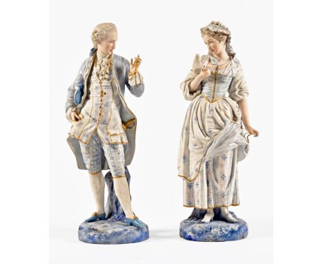 A pair of continental bisque figures, lady and gentleman both with green anchor mark to the base.  Height +/- 42 cm.   CONDIT