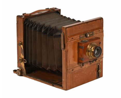 An ICA Dresden mahogany tailboard half plate camera, with Anastigmat Rex Luxior lens. 