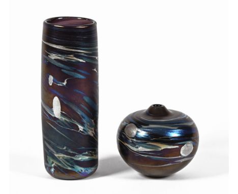 Karen Lawrence 1960-2013, two Art Glass iridescent vases, the first of squat form.  Height +/- 11 cm signed Karen Lawrence 19