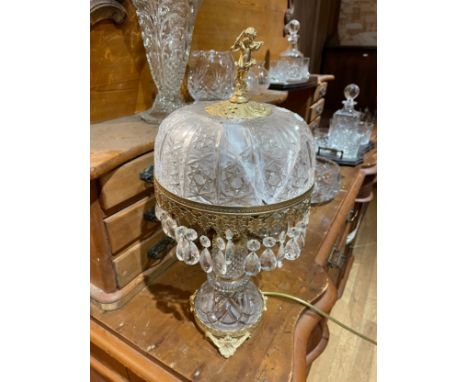 An assortment of crystal and cut glass vases, jugs, lamps, decanter sets and bowls to include Stuart and Caithness (15) 