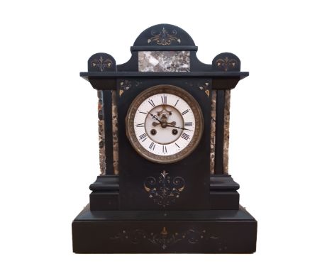 A Victorian black slate mantel clock, with etched floral decoration, white enamel dial with Roman numerals, exposed balance w