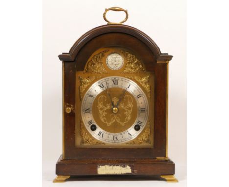 An F. W. Elliott striking bracket clock, retailed by Garrard &amp; Co Ltd, London, gilt decoration dial with Roman numerals a