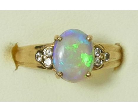 A 9K gold opal and brilliant cut diamond ring, N, 2.3gm 