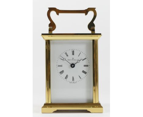 A fine mid 20th century carriage clock by Kenley, brass case, bevel edged glass panels, enamelled dial with roman numerals, 8
