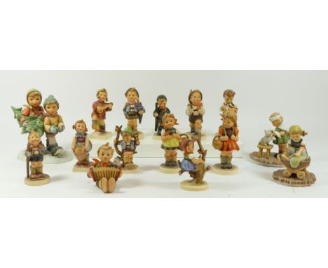 A collection of fifteen Hummel figurines to include Apple tree boy and Apple tree girl. Year shown where available, model num
