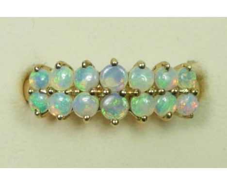 A 9ct two row opal ring, N 1/2, 2.4gm 