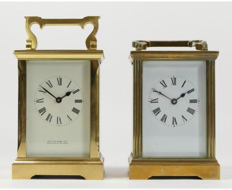 Two French manual wind carriage clocks, brass cased, enamel dials with roman numerals with 8 day movements. (2) 