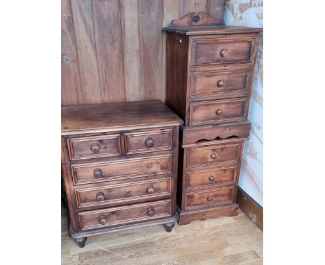 A dark waxed stained pine chest of two over three drawers, 72 x 50 x 79cm, together with two bedside sets of drawers, 46 x 42