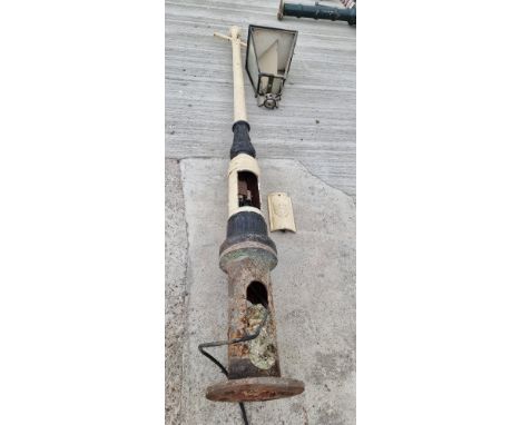 A Victorian cast iron Hull County Council street lamp, the power box with cast three crowns motif, copper lamp surmount, over