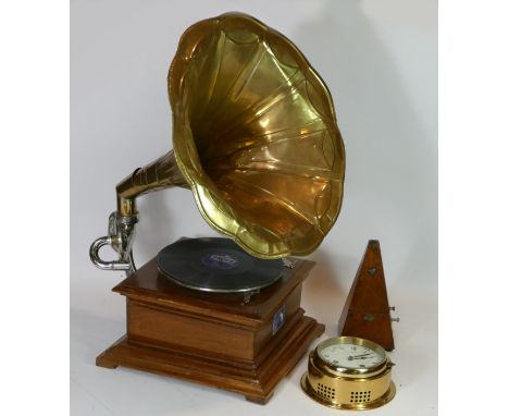 A reproduction His Masters Voice gramophone, together with a metronome and a Talamex ships bulk head clock 