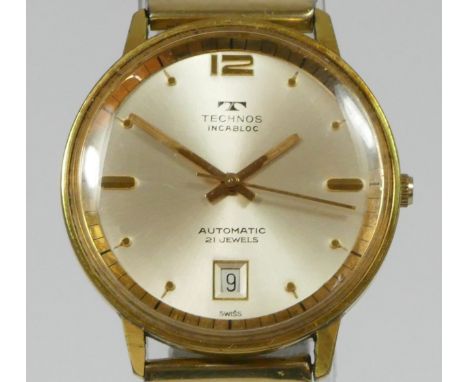 Technos, a gilt metal automatic date gentleman's wristwatch, 35mm, later expanding strap 