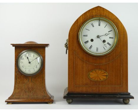 An Edwardian period oak inlaid mantel clock, 8 day French movement, convex porcelain dial &amp; brass bezel surround, inlaid 