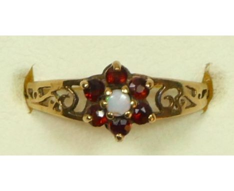 A 9ct gold opal and garnet cluster ring, N, 1.1gm 