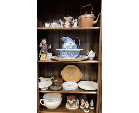 An Allertons 1831 stamped double sided lustre toby jug teapot with lid, 19cm x 24cm wide, showing a small crack near spout.  
