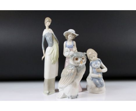 Four Nao Porcelain Figures including Girl holding a Dog, Girl holding a sheath of wheat, 31cm high Owl and Girl holding a Ted