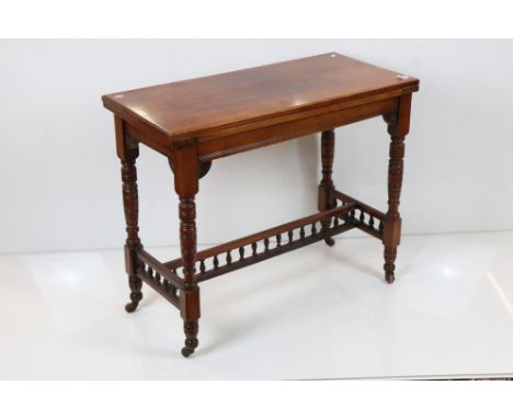 Late Victorian / Edwardian Mahogany Fold-over Card Table, the rectangular top opening to a green baise playing surface, raise