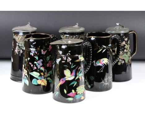 Four Victorian Jackfield style Water Jugs with Pewter Lids together with Seven further Jackfield style  Jugs, all black with 