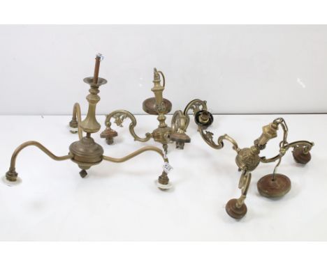A group of three brass central hanging light fittings to include a pair of three branch examples. 