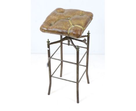 Victorian adjustable Square Stool with brass studded brown leather button seat raised on square metal base with brass finials