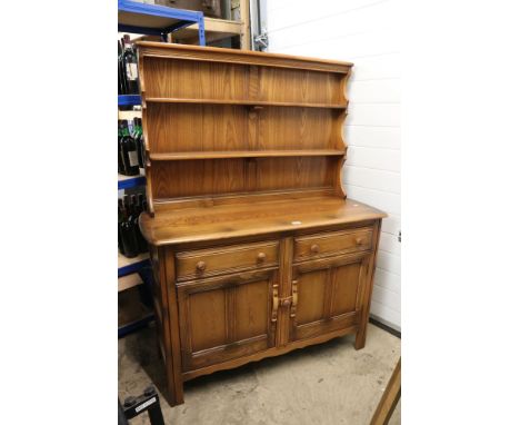 Ercol ' Golden Dawn ' Elm Dresser, the upper section with two plate shelves, over a base with two drawers and two cupboard do