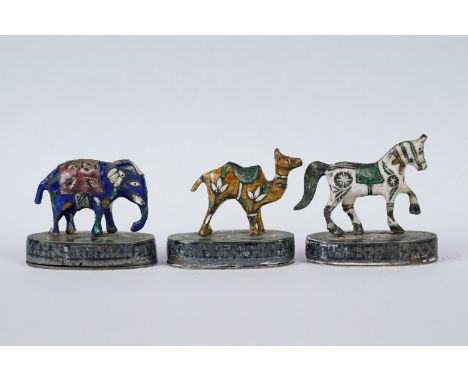 A group of three Indian silver and enamel figures in the form of a camel, elephant and a horse. 