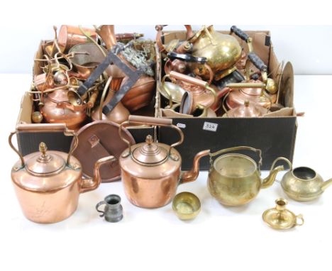 A large collection of mixed brass and copper ware to include teapots, trivets, jugs, pots and plates...etc. 