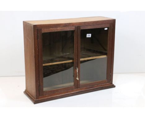 Oak Wall Cabinet, the two glazed doors opening to shelf, with key, 72cm high x 57cm high 