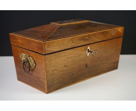 Regency Rosewood and Boxwood Inlaid Tea Caddy of sarcophagus form, the hinged lid opening to two lidded compartments and empt