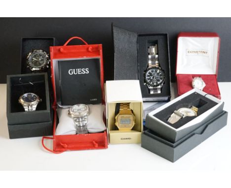 A collection of gents and ladies fashion watches all within original boxes to include Casio and Guess examples. 