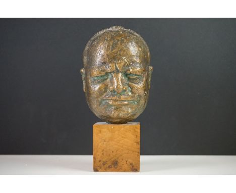 Bronze Bust of Sir Winston Churchill raised on a wooden plinth, 20cm high 