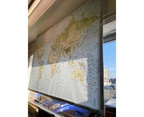 A world map print on canvas