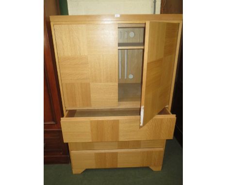 Modern light coloured oak double door cupboard/ TV cabinet with three drawers to base, 160cmHx100cmW 