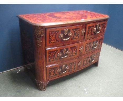 C19th fine quality Continental marquetry shallow bow front chest of two short and 2 long drawers, with replacement ormolu han