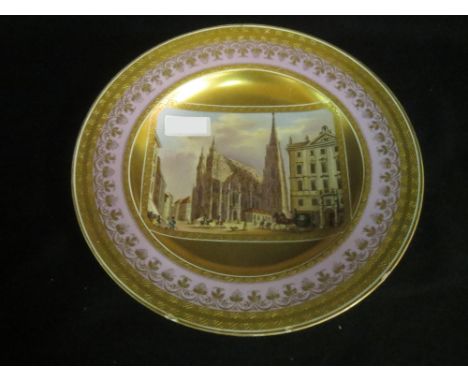 Good Vienna circular light blue and acid gold plate, painted with a scene "Place de St Etienne, Vienna", figures and horse dr