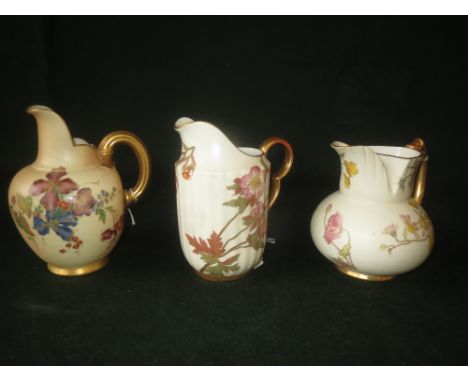 Three various Royal Worcester jugs including Pattern No's 1438 and 1094 approx 5ins high
