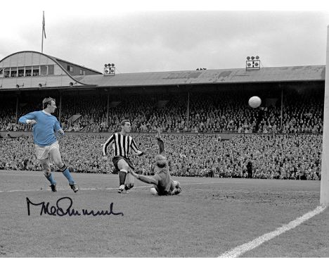 Football Autographed MIKE SUMMERBEE 16 x 12 Photo : Colz, depicting Manchester City's MIKE SUMMERBEE dinking the ball over Ne