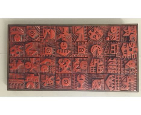 A ceramic panel by Ron Hitchins (b 1926), signed with Heals label to reverse