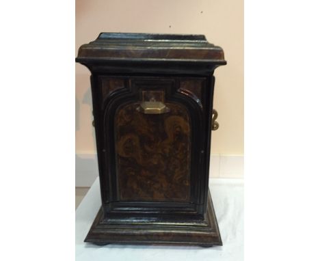 A 19th century Toleware coal cupboard in burr walnut effect with brass shovel to the back and ceramic handles