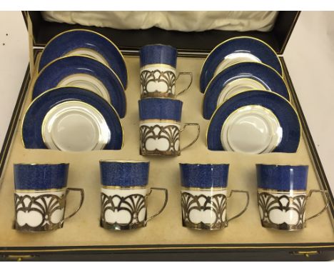 Cased Crown Staffs silver handled coffee cans/saucers