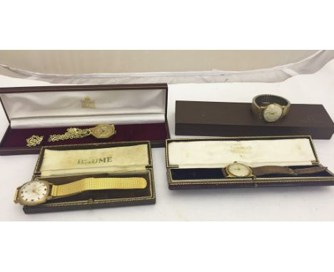 Three cased gents watches together with a pocket watch on a chain